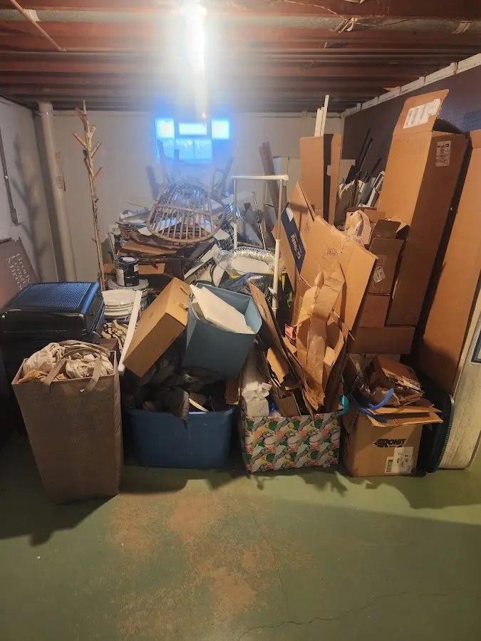 Roll-off dumpster container at job site for 2 Yard Dumpster Rental in Madill